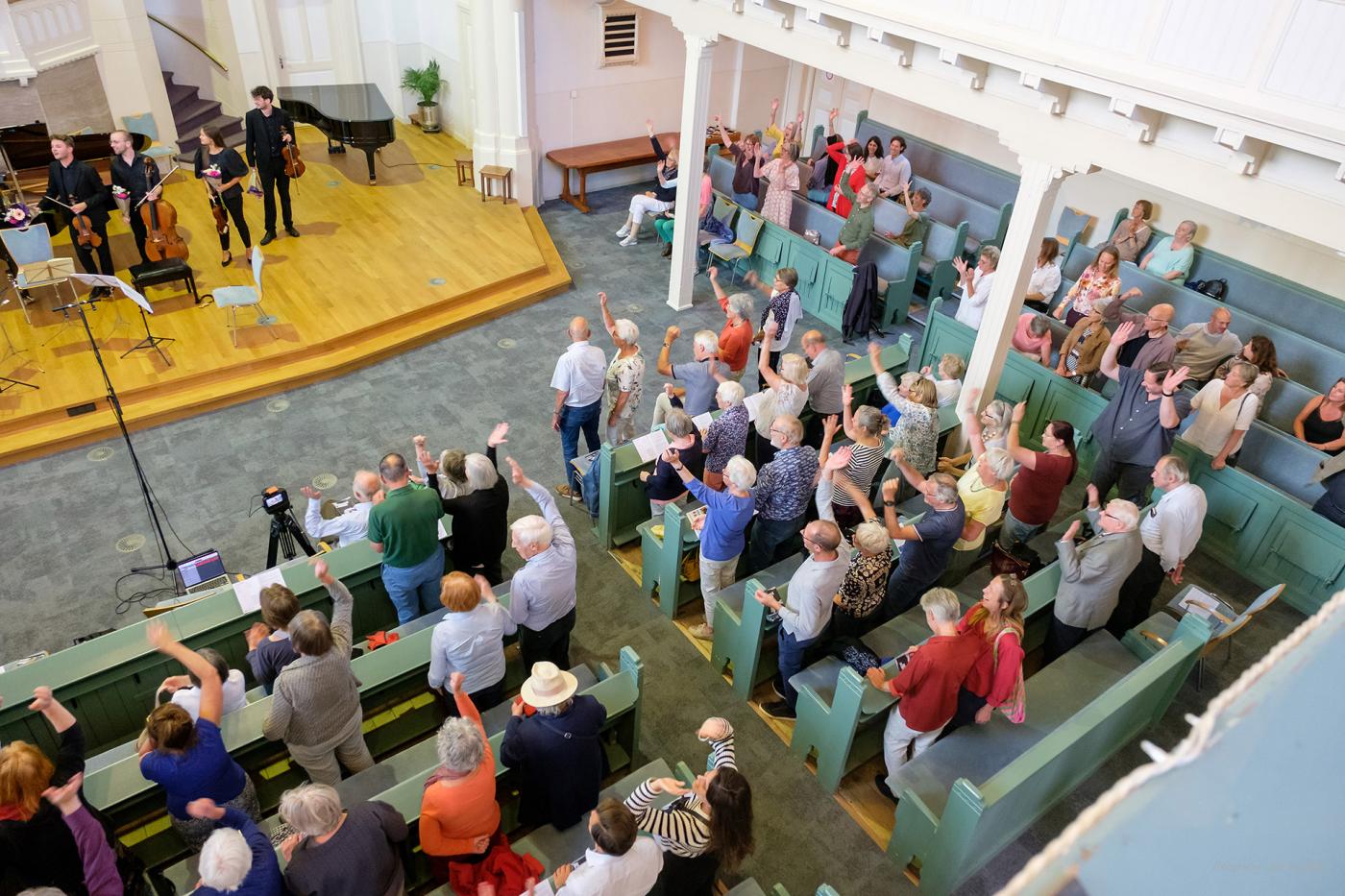 Foto van een kamermuziek concert in de Bergsingelkerk
